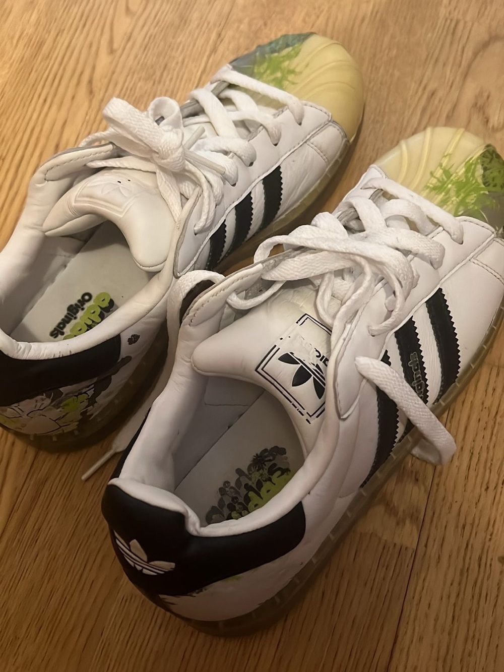 adidas Kids White Sneakers with Black Stripes and Green Toe Detail